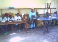 Female participant sharing during a group discussion