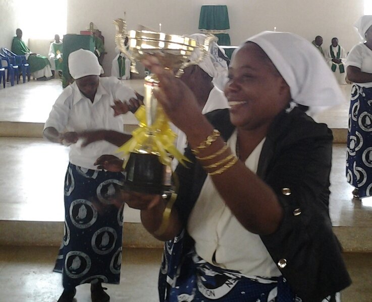 Nakonde Parish representative celebrating with the trophy