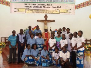 Bishop Mulenga with Hospital workers